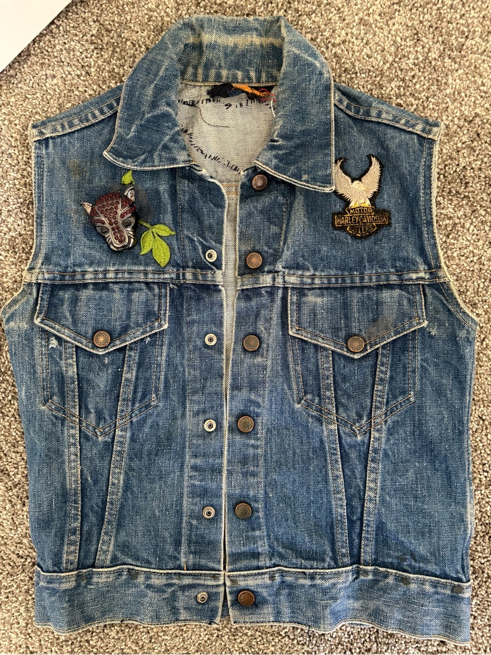 Vintage Blue Denim Biker Vest with Harley Davidson patches and eclectic pins.